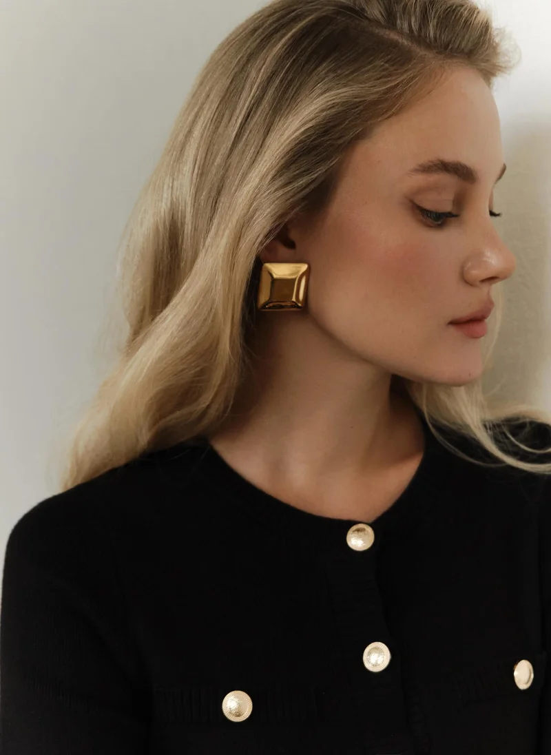 Square stud earrings in glossy metal