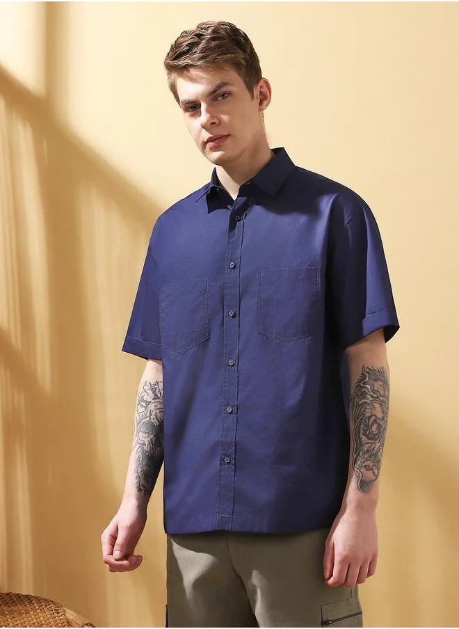 Dennis Lingo Navy Relaxed fit Shirts Solid design crafted from 100% Cotton featuring Half Sleeve with Button closure.