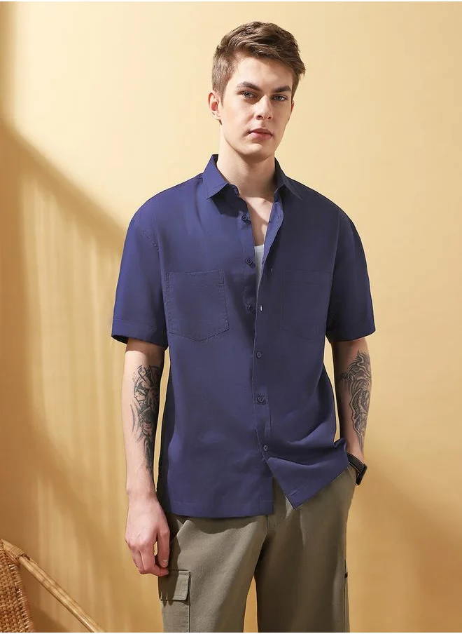 Dennis Lingo Navy Relaxed fit Shirts Solid design crafted from 100% Cotton featuring Half Sleeve with Button closure.