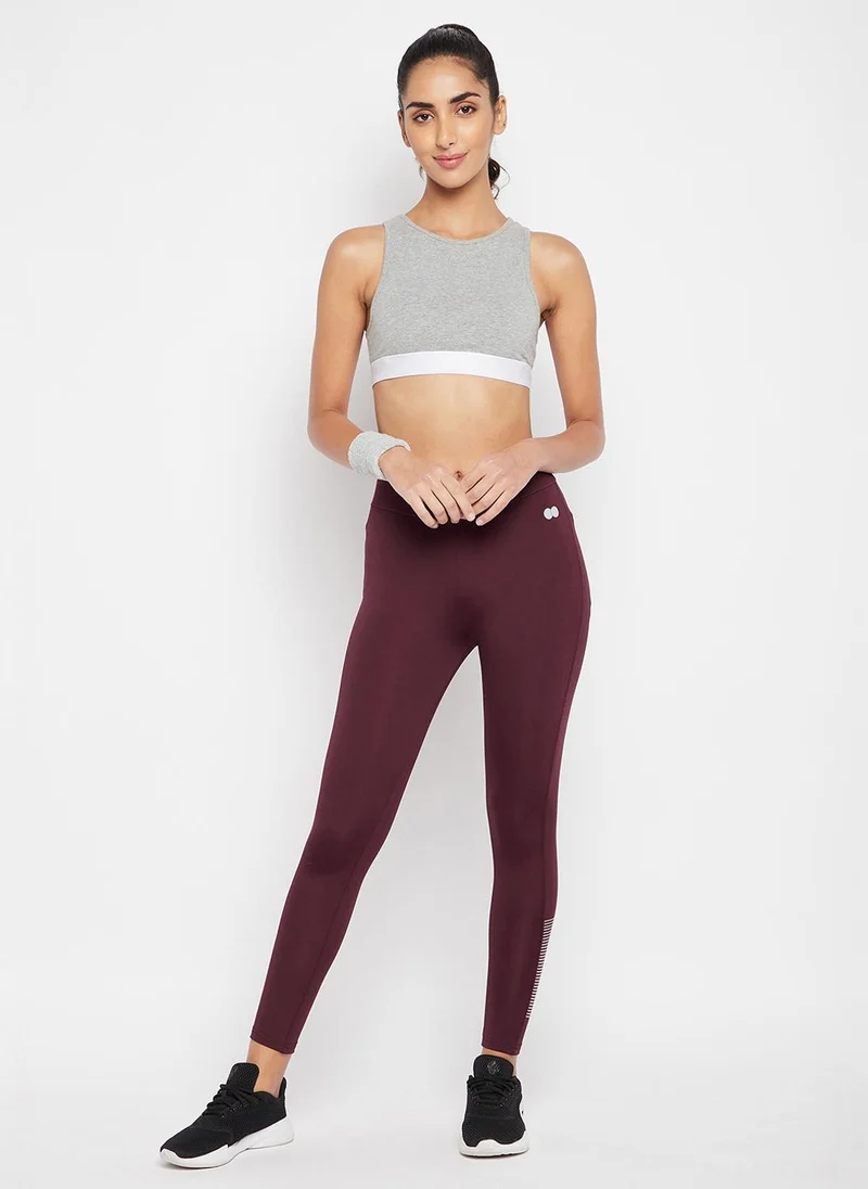 كلوفيا Clovia Snug Fit High Rise Active Tights in Plum Colour