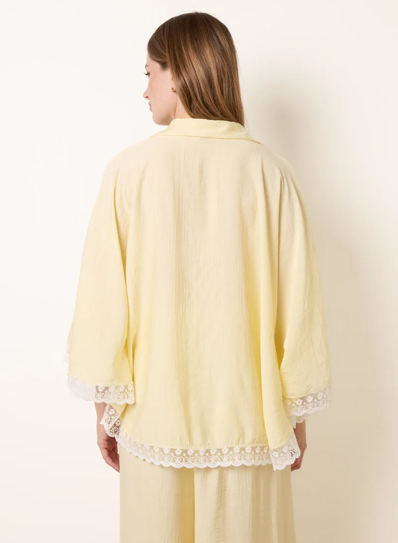بلو فانيلا Oversize Crinkle Lace Hem Shirt