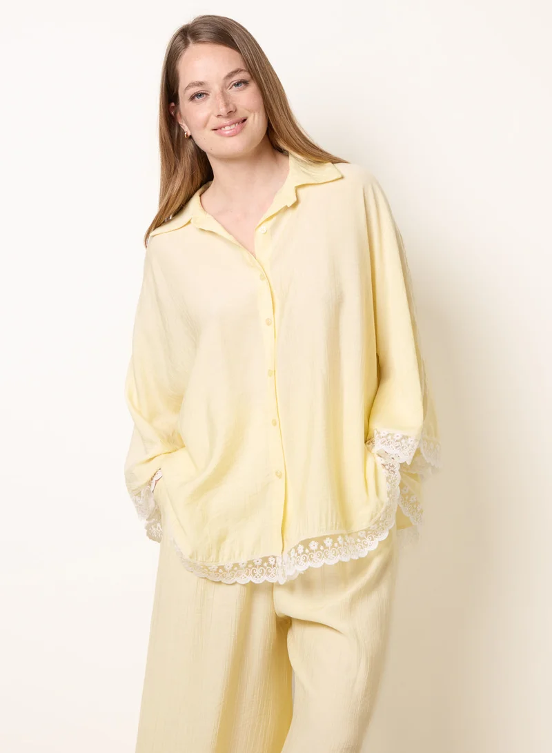 بلو فانيلا Oversize Crinkle Lace Hem Shirt