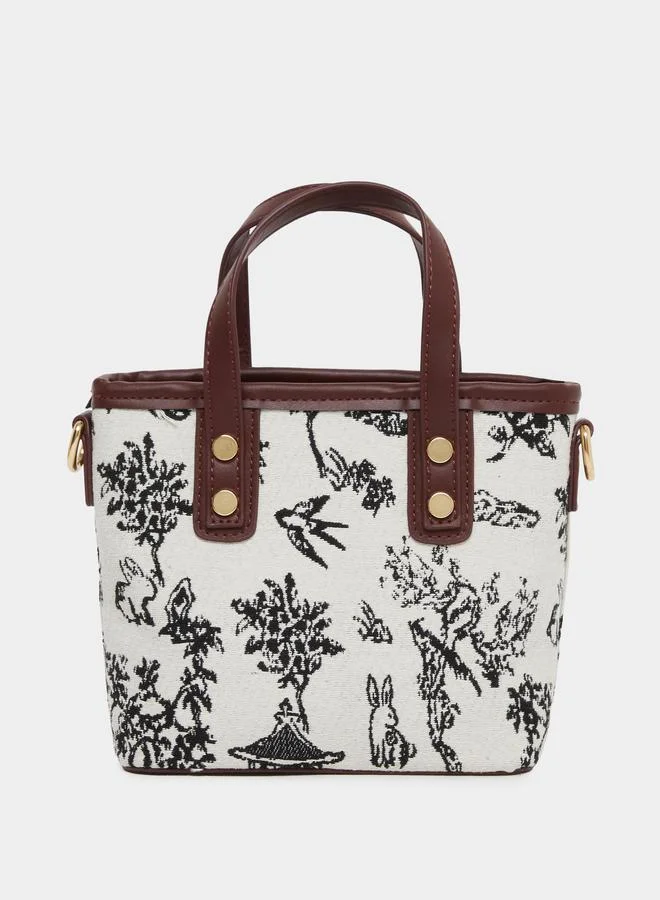 ستايلي شنطة كبيرة بتفاصيل طباعة