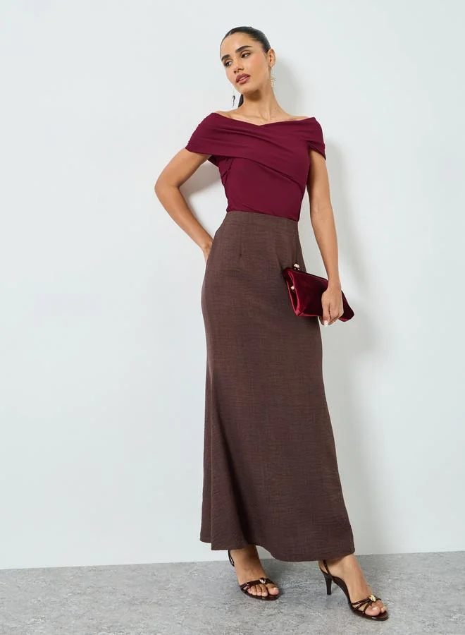 ستايلي بلوزة محبوكة بأكتاف مكشوفة