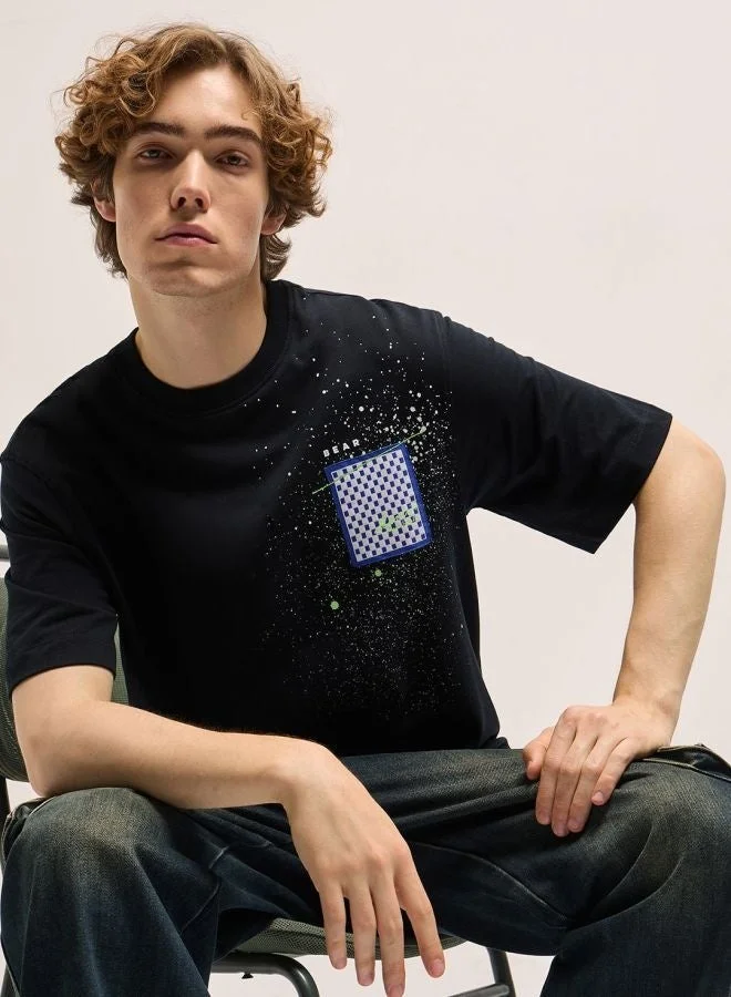 THE BEAR HOUSE  Men's Black Oversize splatter paint effect Crew Neck T-shirt Perfect For Casual Wear, Gym, Travel, Or Layering Stylish And Versatile Essential For Every Wardrobe for Men | Best Price UAE