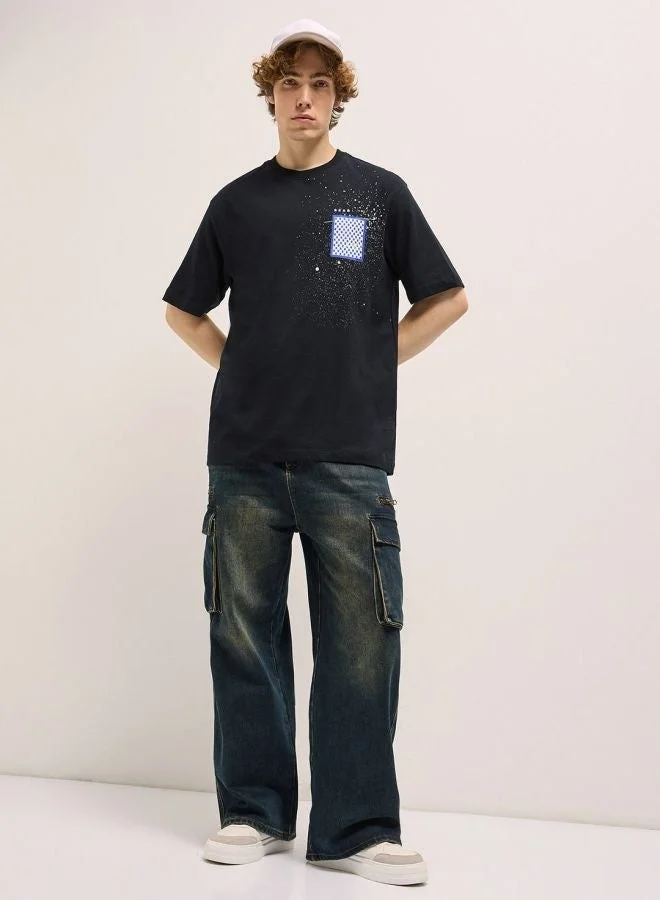 THE BEAR HOUSE  Men's Black Oversize splatter paint effect Crew Neck T-shirt Perfect For Casual Wear, Gym, Travel, Or Layering Stylish And Versatile Essential For Every Wardrobe for Men | Best Price UAE