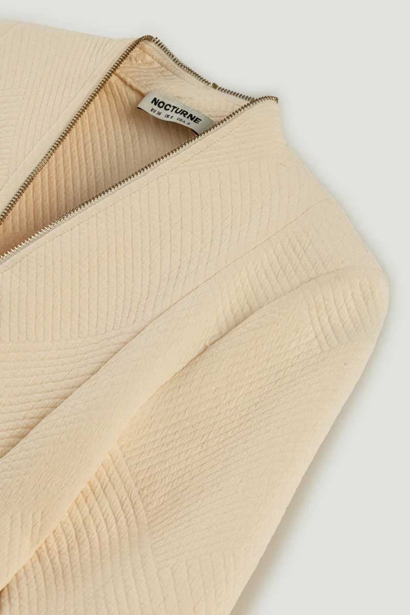 نوكتورن بلوزة بسحاب أمامي بنقوش