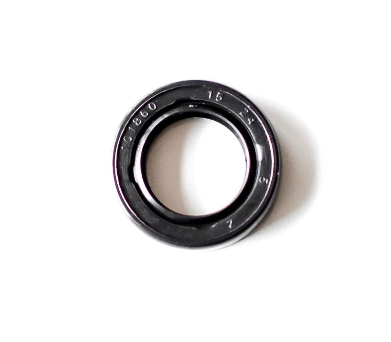 EAI Oil Seal 15mm X 24mm X 5mm TC Double Lip w/Spring. Metal Case w/Nitrile Rubber Coating - Image 1
