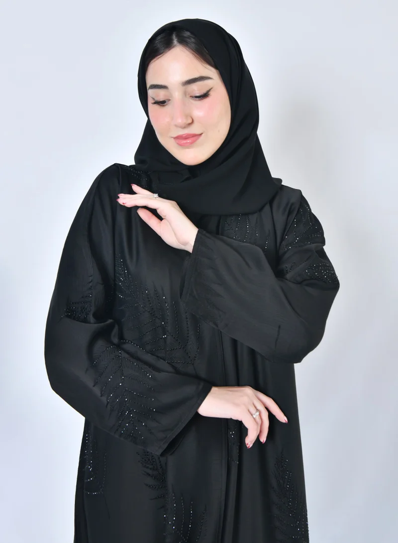 عبايات حوراء عباية لف سوداء بتطريز ورقي على كامل القماش مزين بفصوص سوداء براقة