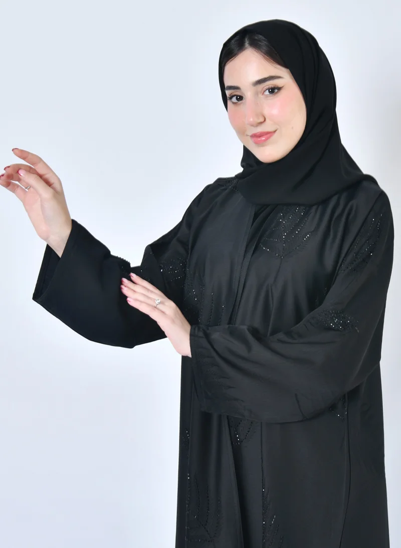 عبايات حوراء عباية لف سوداء بتطريز ورقي على كامل القماش مزين بفصوص سوداء براقة