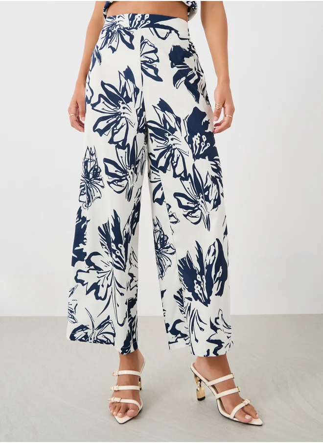 ستايلي Styli All-Over Floral Print Wide Leg Pants with Elasticated Waistband