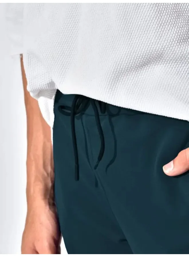 مانياك بنطلون رياضي رجالي أزرق سماوي بقصة ضيقة من نسيج فرنسي تيري بوليستر وليكرا بطبعة مانياك