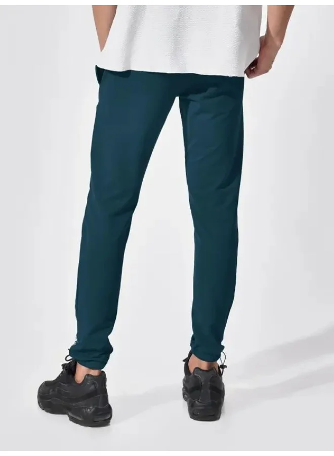 Maniac  Maniac Mens Printed 95% Polyester 5% Lycra French Terry fabric Denim Blue Slim Fit Trackpant for Men | Best Price UAE