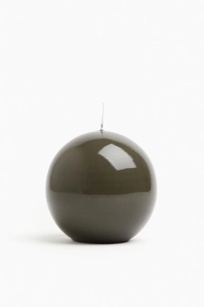 اتش اند ام شمعة بتصميم مستدير