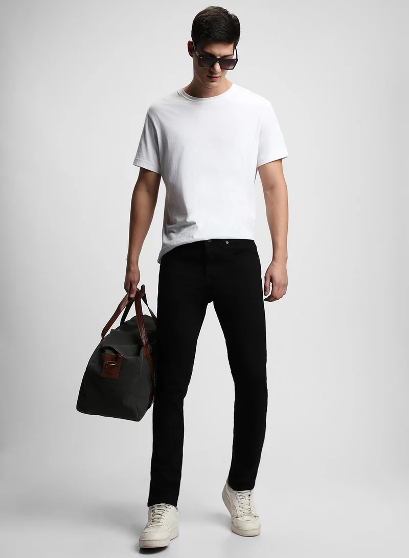 دينيس لينغو جينز قطن أسود بقصة ضيقة للرجال مع إغلاق بأزرار وسحاب