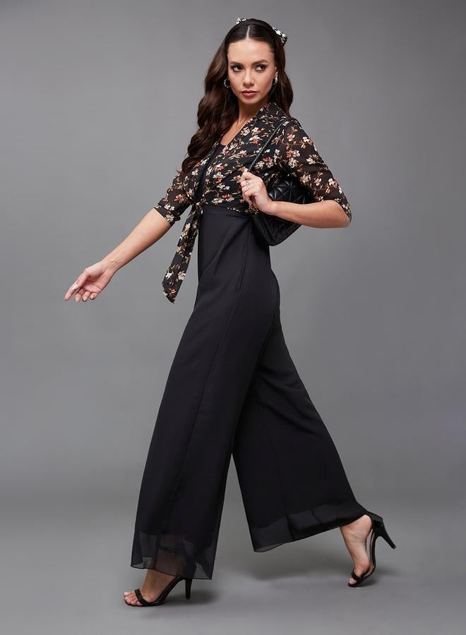 Styli Floral Print Round Neck Wide Leg Jumpsuit with Tie-Up Detail - Image 2