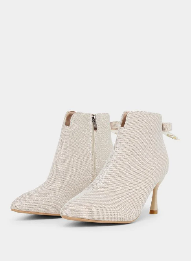 تايك تو بوت سادة بطول الكاحل وتفاصيل بارزة الملمس