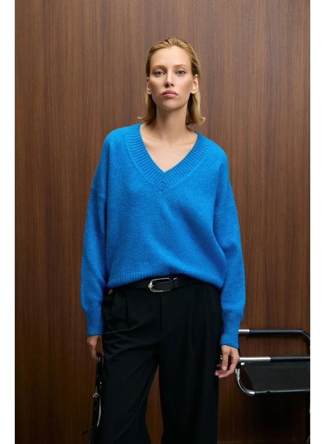 GRIMELANGE NORSHA Women's V-Neck Soft-Textured Relaxed Fit Knit Blue Sweater.