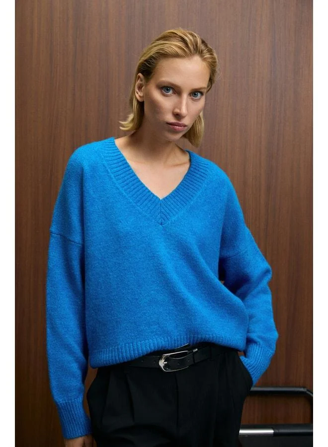 GRIMELANGE NORSHA Women's V-Neck Soft-Textured Relaxed Fit Knit Blue Sweater.