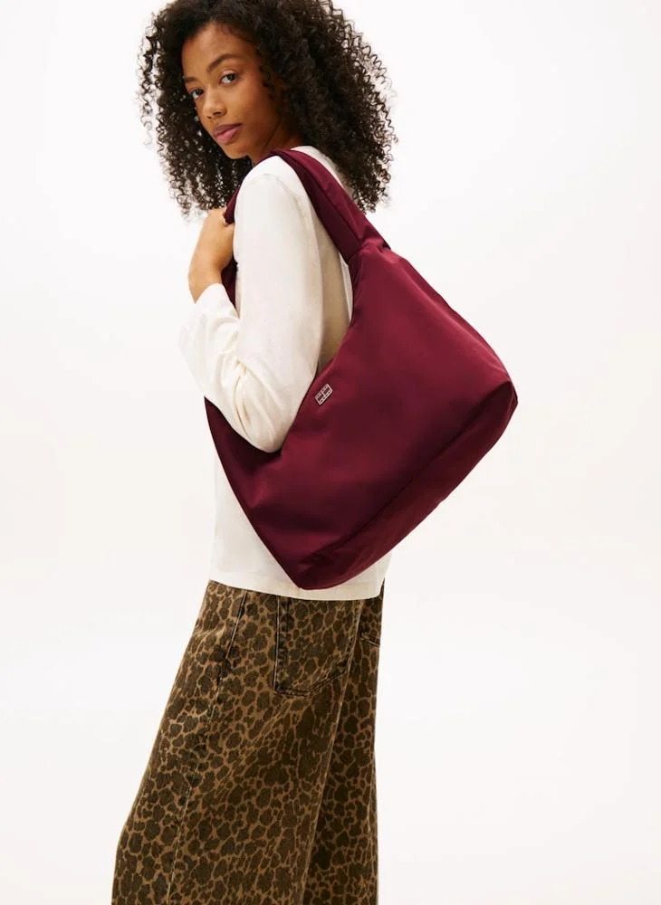 تومي جينز حقيبة هووبو مبطنة بلوحة شعار معدنية