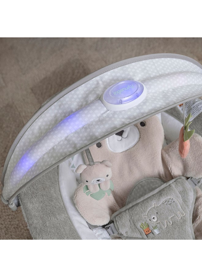 ingenuity - InLighten Baby Bouncer Seat with Light Up Toy Bar and Bunny Tummy Time Pillow Mat - Image 1