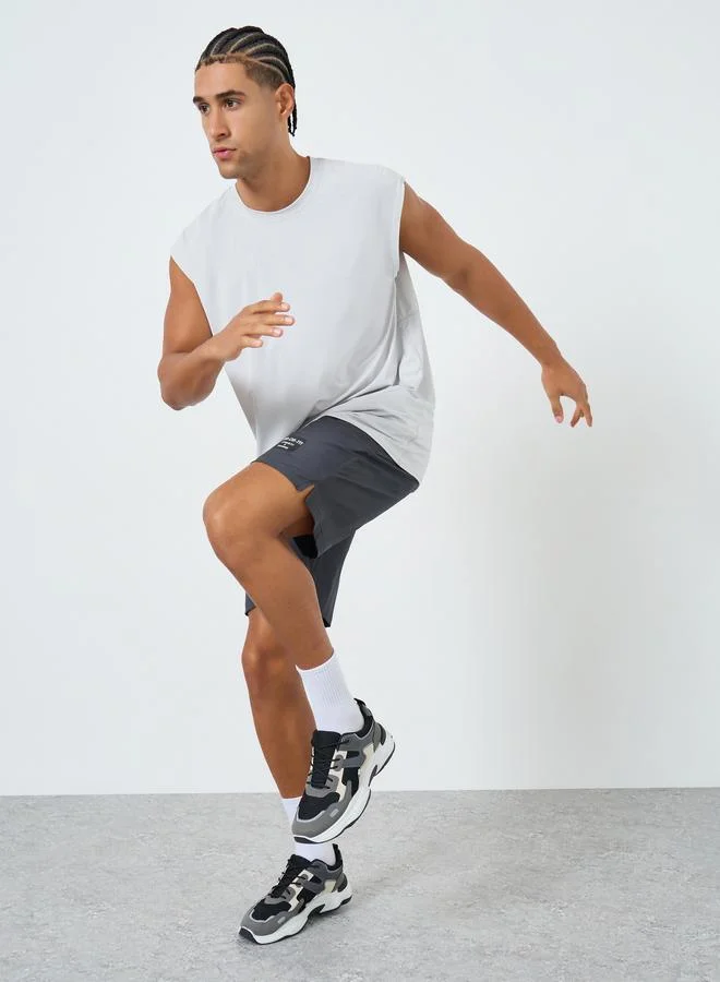 ستايلي اكتيف تانك رياضي بقصة عادية سريع الجفاف بفتحات شبكية