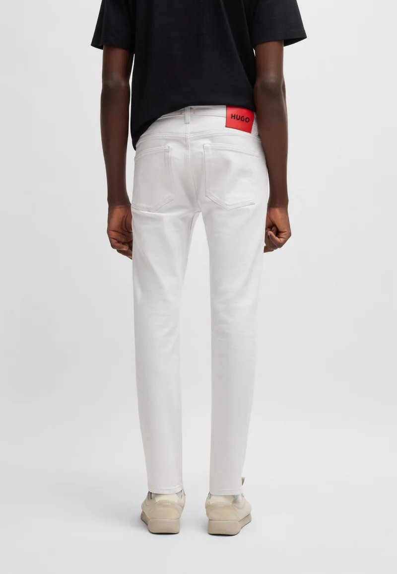 هوجو جينز أبيض بقصة نحيفة جداً من قماش دينم مطاطي
