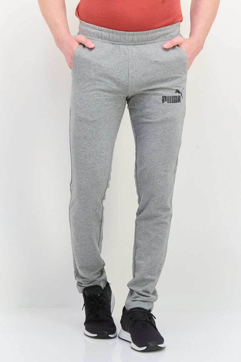 PUMA Men Slim Fit Brand Logo Training Track Pant, Grey - Image 1