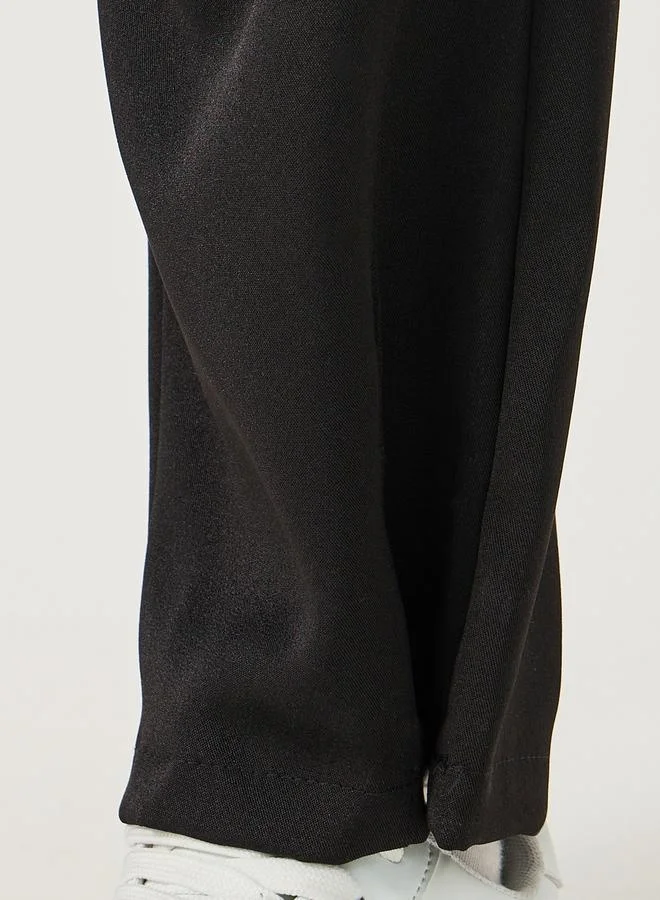 Styli Solid Loose Fit Mid Rise Pants with Drawstring