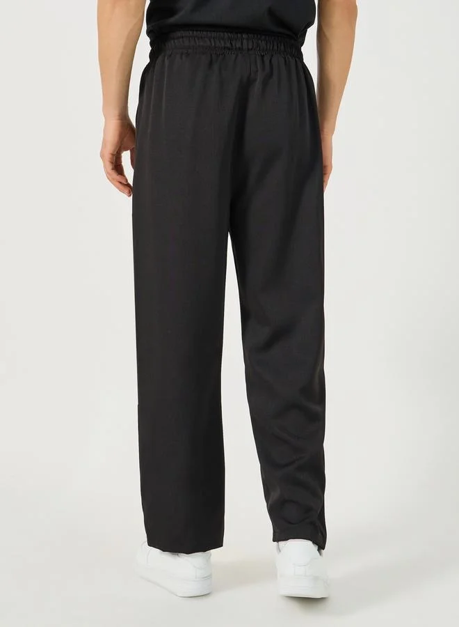 Styli Solid Loose Fit Mid Rise Pants with Drawstring