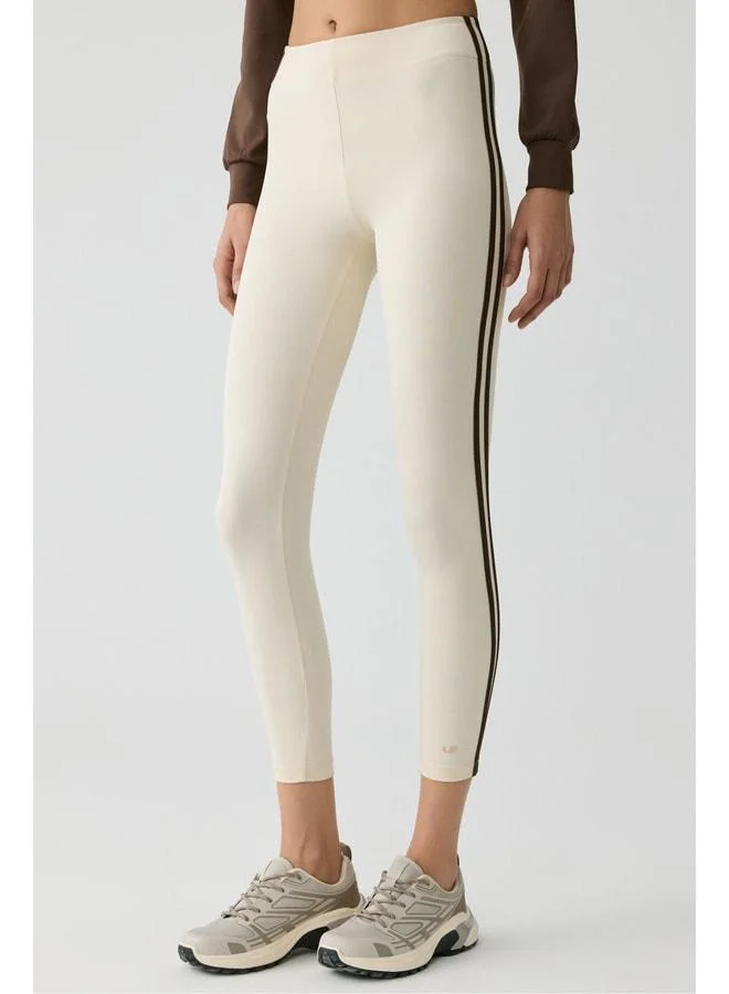 Urban Beat Lolita Women's Side-Stripe Piped Soft Cream Leggings.
