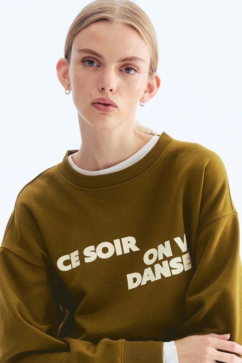 اتش اند ام سويت شيرت مزين بطبعة عبارة