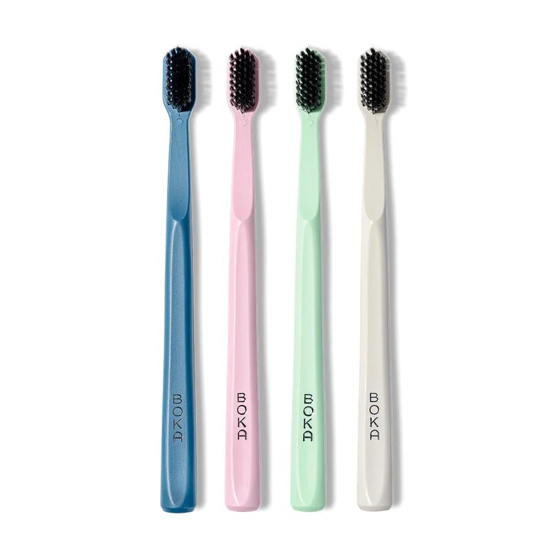 Boka Classic Manual Toothbrush with Extra Soft Activated-Charcoal, Tapered Bristles, Bioplastic Handle that Includes Travel Cap, Dentist-Approved, Great for Adults and Kids, Multi Color (Pack of 4) - Image 1