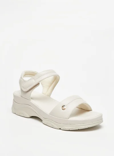 فلورا بيلا من شو إكسبرس Womens Solid Strap Sandals With Hook And Loop Closure