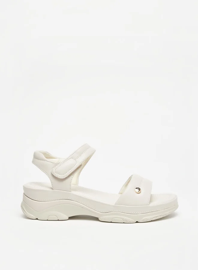 فلورا بيلا من شو إكسبرس Womens Solid Strap Sandals With Hook And Loop Closure