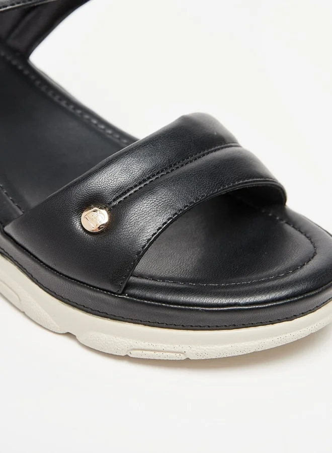 فلورا بيلا من شو إكسبرس Womens Solid Strap Sandals With Hook And Loop Closure