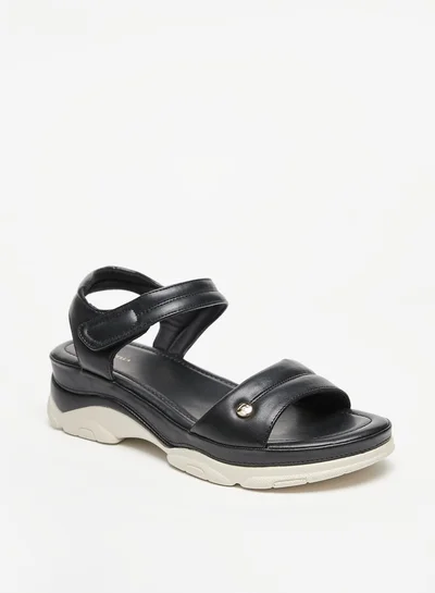 فلورا بيلا من شو إكسبرس Womens Solid Strap Sandals With Hook And Loop Closure