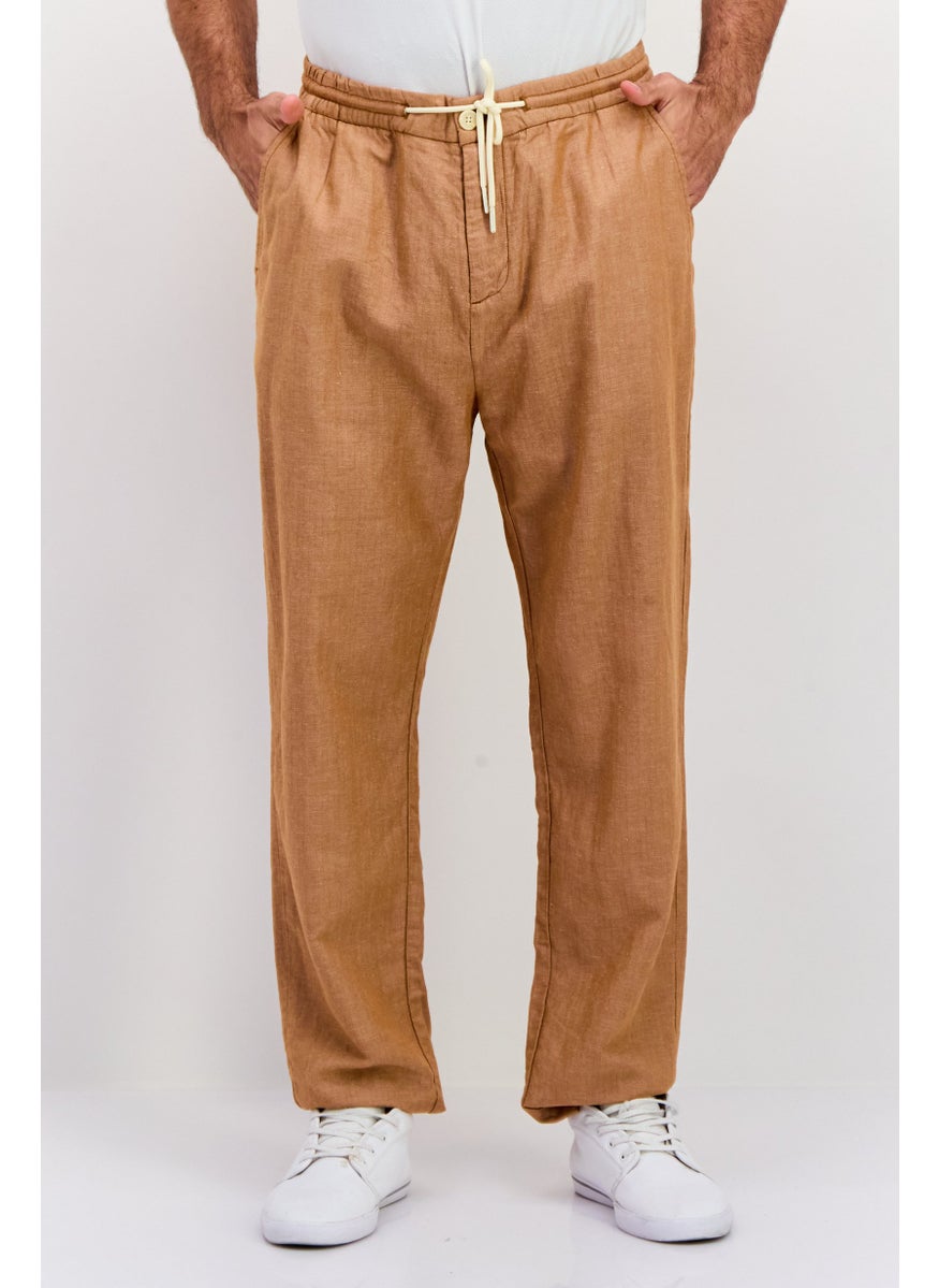 Men Tapered Fit Textured Chino Pants, Tan - pzsku/Z12744C1FCCC10E8CA831Z/45/_/1737641698/f2410862-afad-4292-8f7e-6302d99462c6