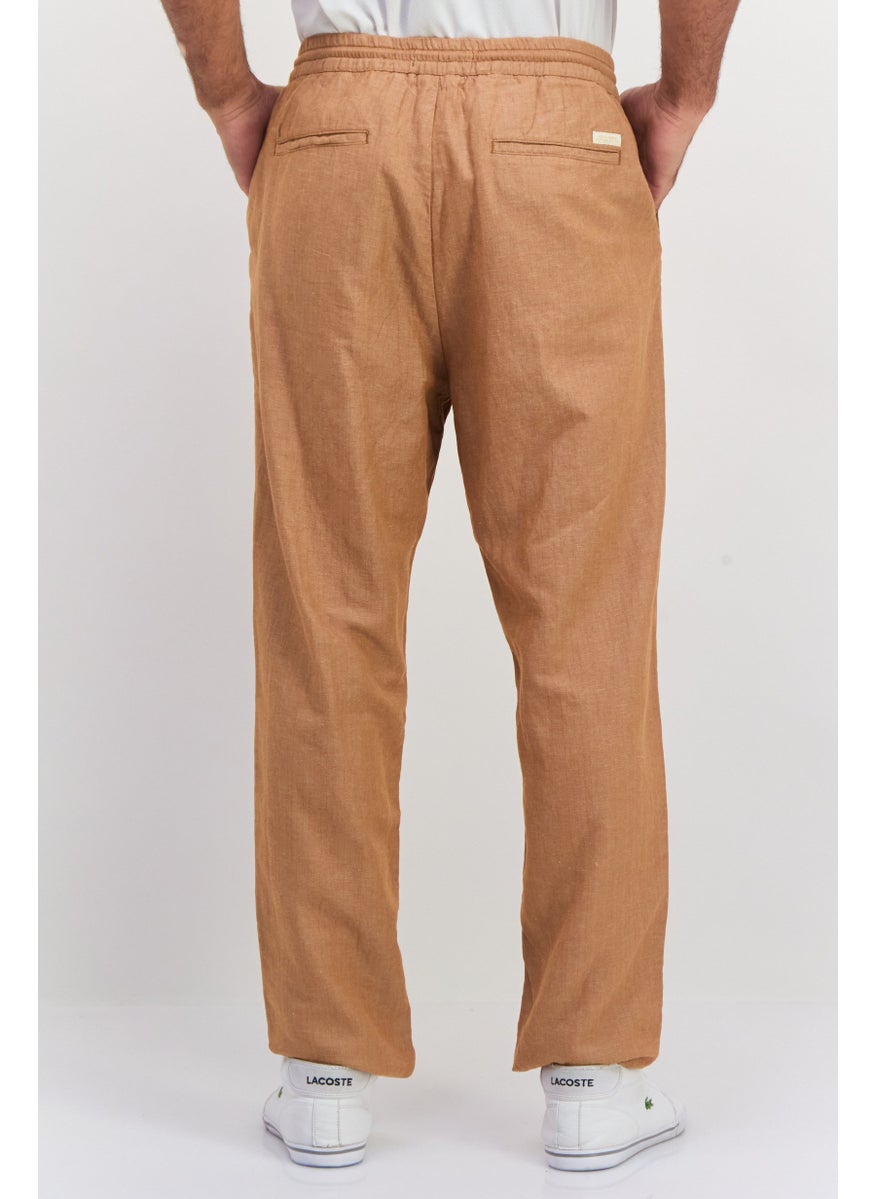 Men Tapered Fit Textured Chino Pants, Tan - pzsku/Z12744C1FCCC10E8CA831Z/45/_/1737641704/e269e5fd-4629-42d2-86cb-ab8183d395c0