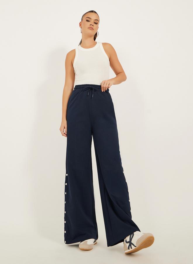 Styli Solid Side Snap Button Hem Joggers - Image 1