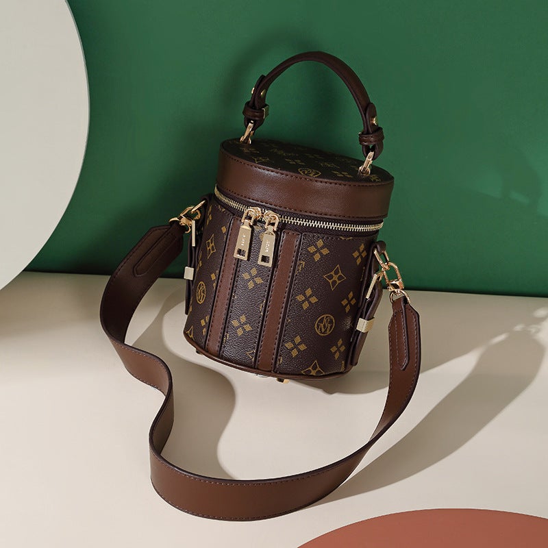 MKF Women's Round Barrel Crossbody Bag - Image 1