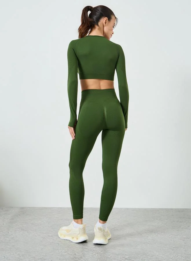 Styli Active Green Green Tonal Jacquard Thumbhole Detail Crop Top and Scrunch Back Leggings Set for Women | Best Price UAE