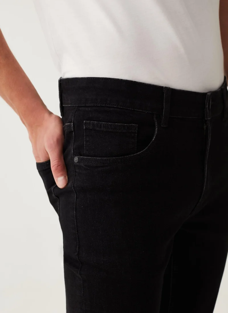 او في اس Slim-fit cross-hatch cotton jeans