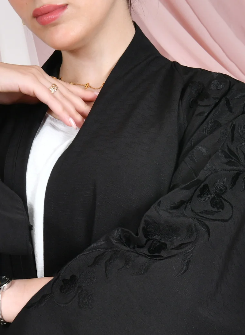 HAWRAA ABAYA Black quarter-length wrap abaya with summer fabric, wide sleeves, and embroidery on the sleeves