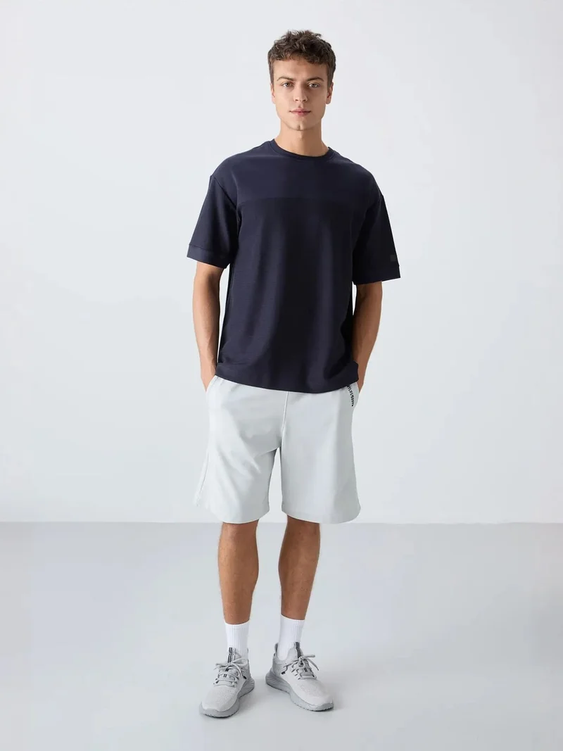 تومي لايف TOMMY Oversized Cotton-Blend Crew Neck T-Shirt