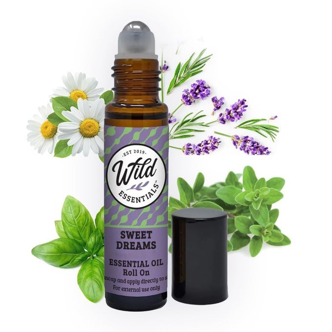 WILD ESSENTIALS SWEET DREAMS ESSENTIAL OIL ROLL ON 10ML FOR SLEEP RESTLESS LEGS MADE WITH 100 PURE PREMIUM GRADE ESSENTIAL OILS AND ORGANIC JOJOBA OIL READY TO USE MOISTURIZER ALL NATURAL