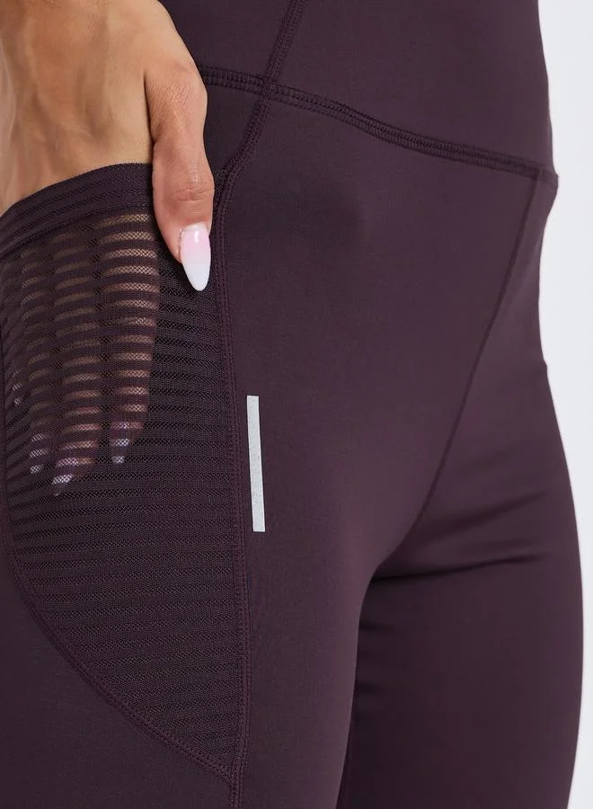 Styli Active  Women Textured Pocket Reflective Stripe 7/8 Leggings for Women | Best Price UAE
