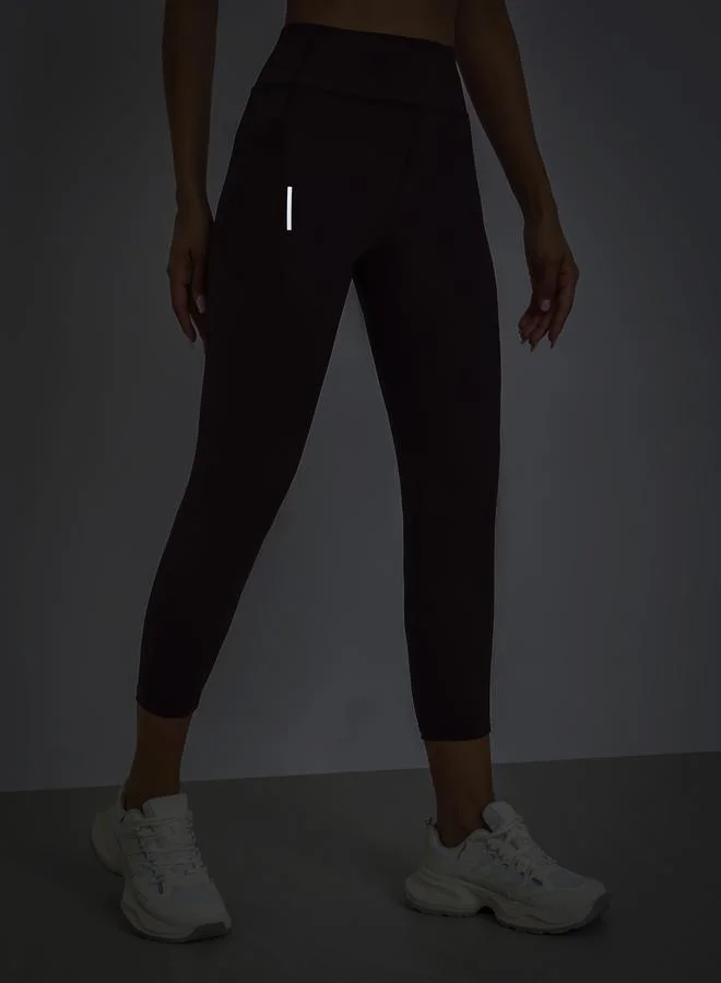 Styli Active  Women Textured Pocket Reflective Stripe 7/8 Leggings for Women | Best Price UAE