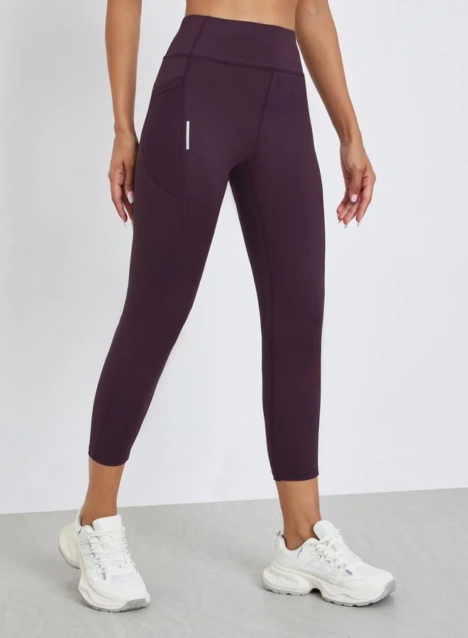 Styli Active Women Textured Pocket Reflective Stripe 7/8 Leggings