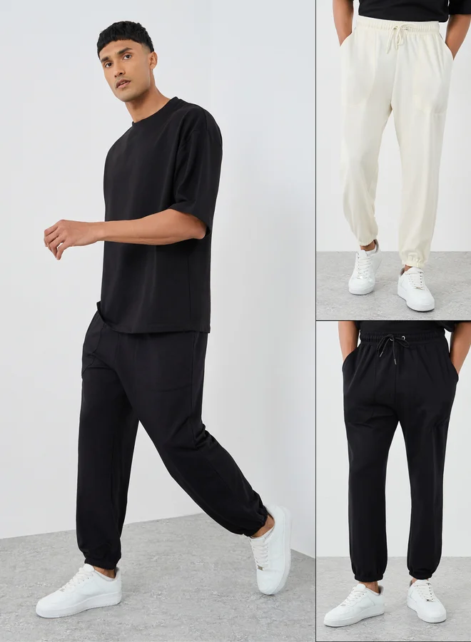 Styli Styli Pack of 2 - Solid Oversized Panelled Terry Joggers